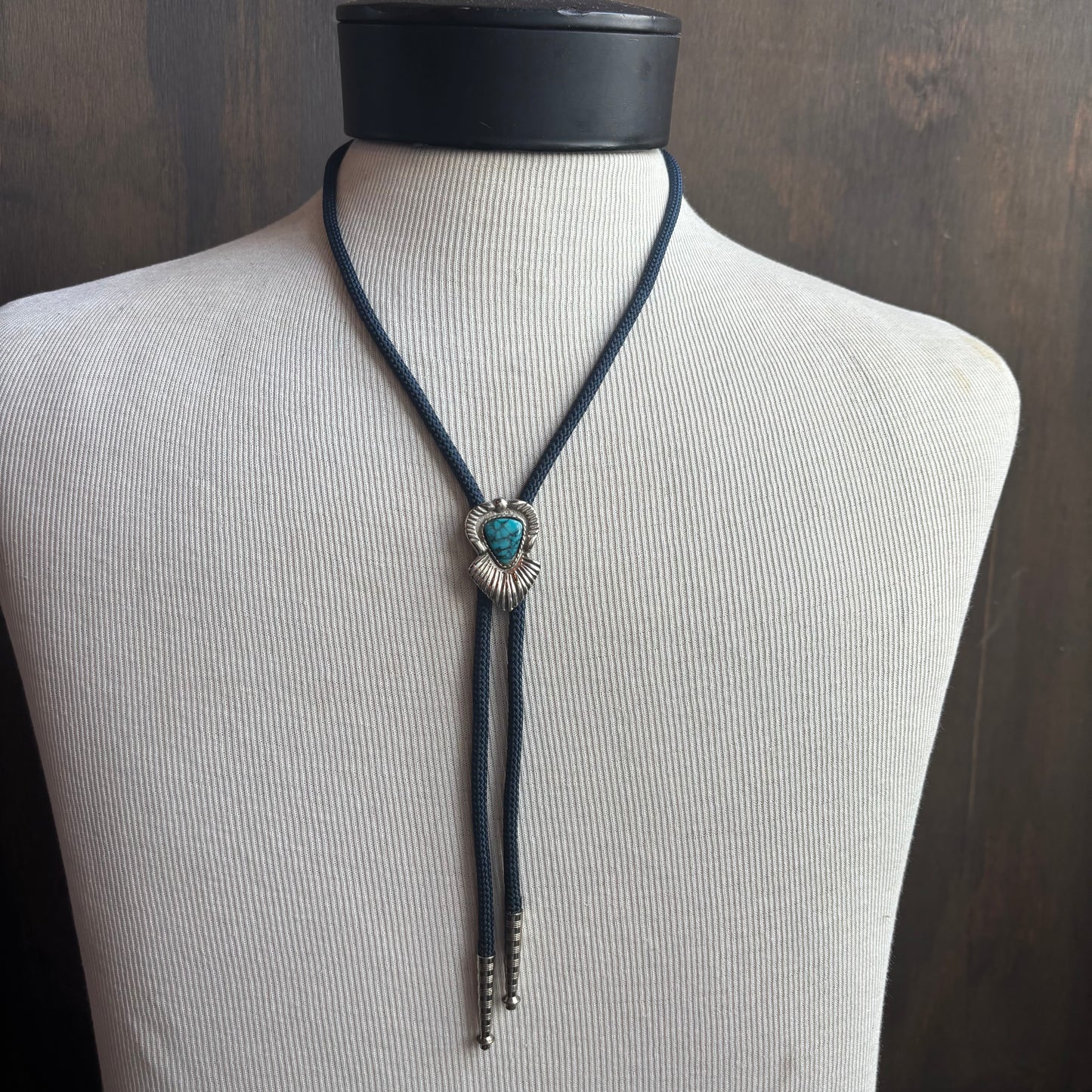 Blue Stone Bolo on Blue Tie