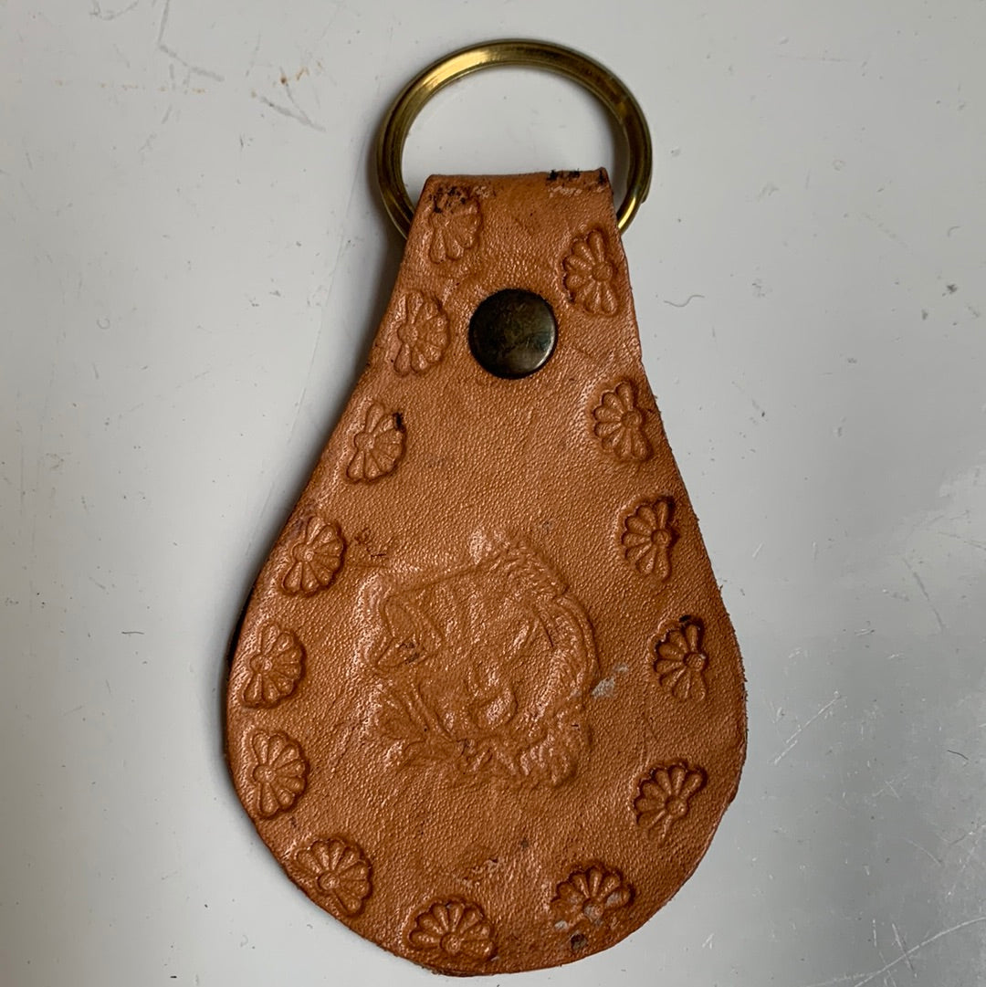 Tooled leather jumping fish key chain with flower edge