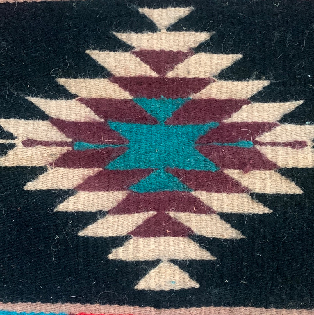 Burgundy, teal & black weaving