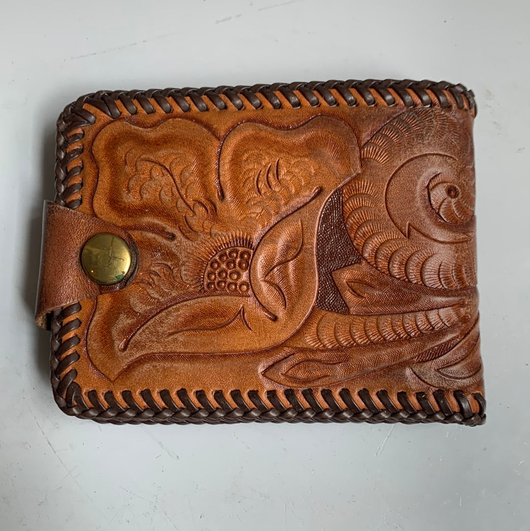 Tooled leather wallet with colorful insert