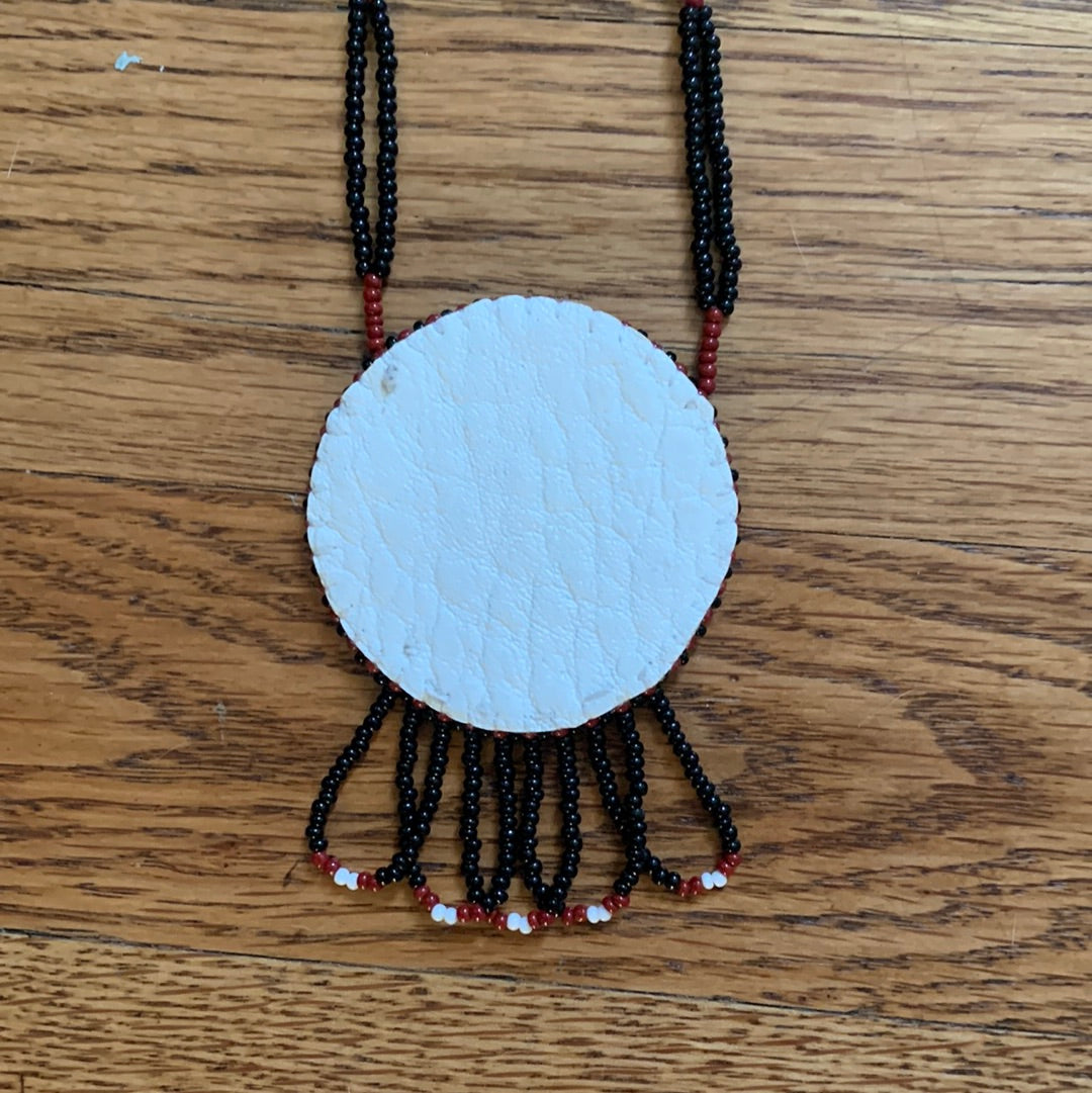 Beaded burgundy, white & black medallion necklace with fringe