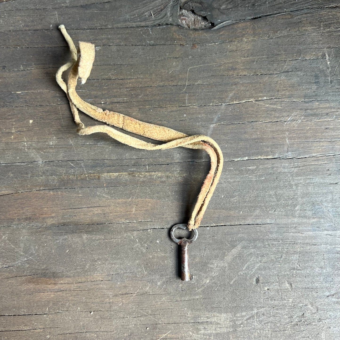 Silver Key Pendant on Leather Tie