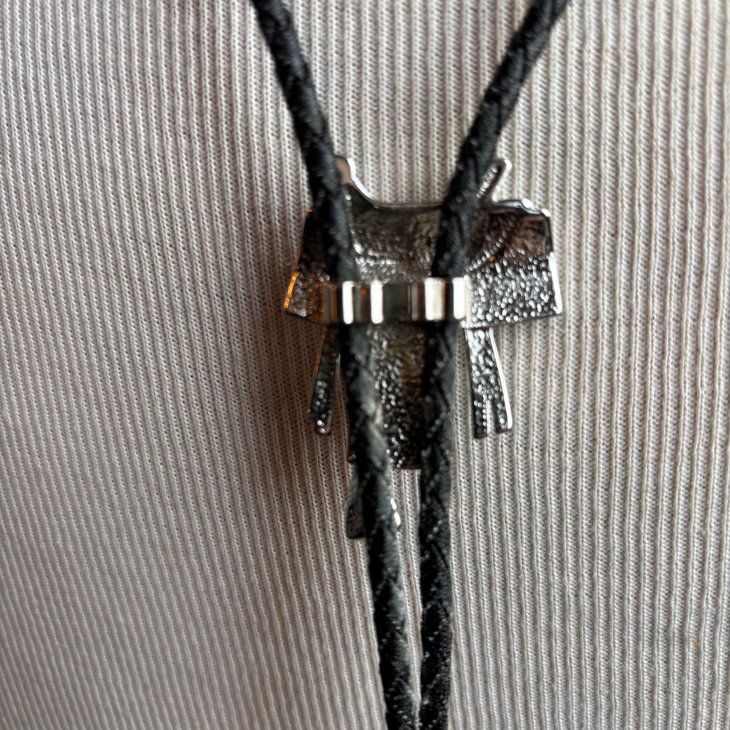 Silver Saddle Bolo on Black Leather Tie