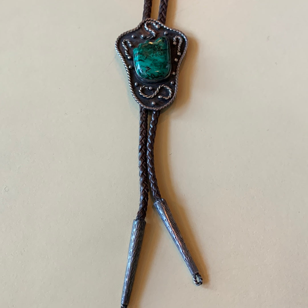 Bolo tie with green stone