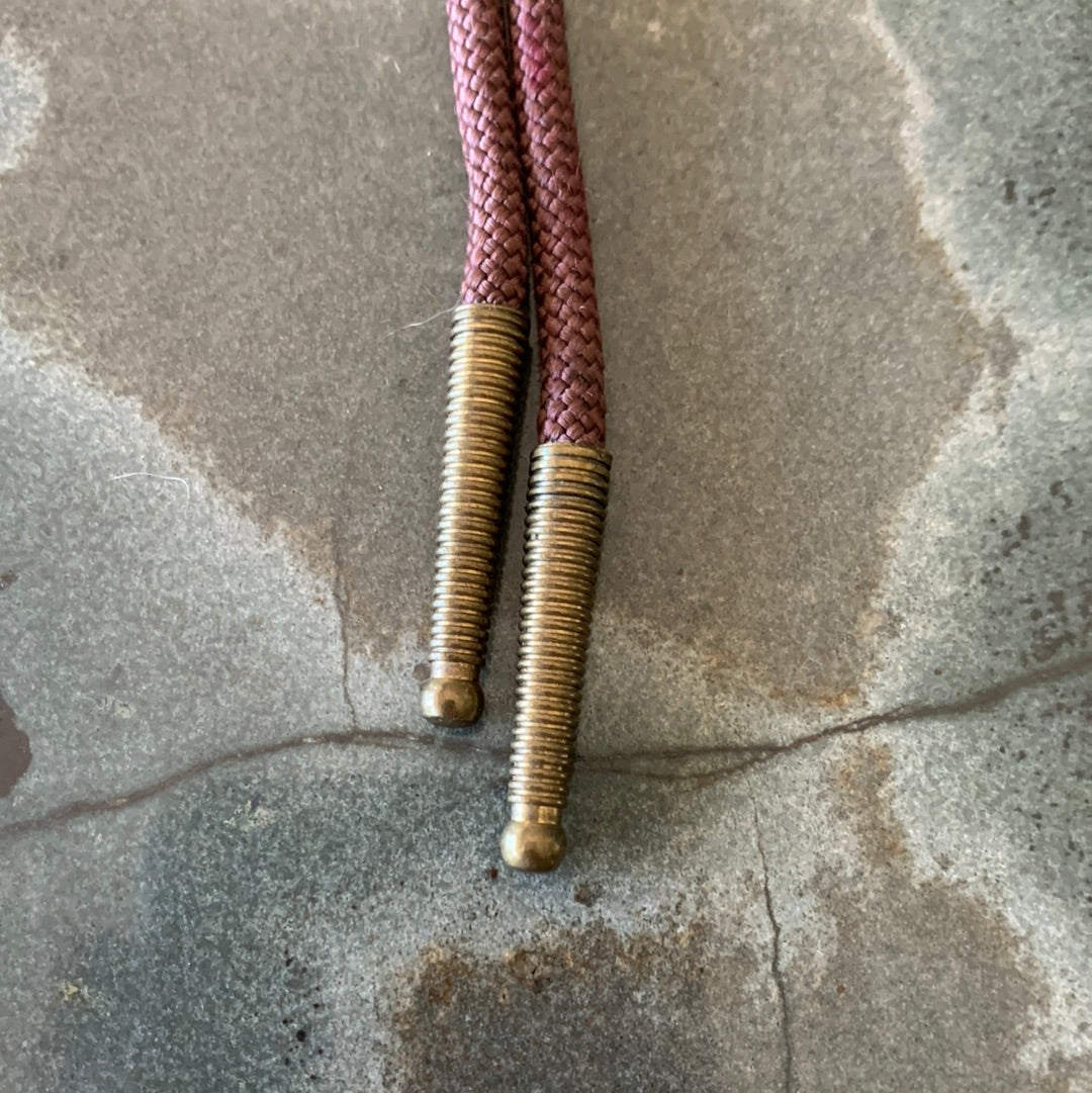 Silver compass with brown cord