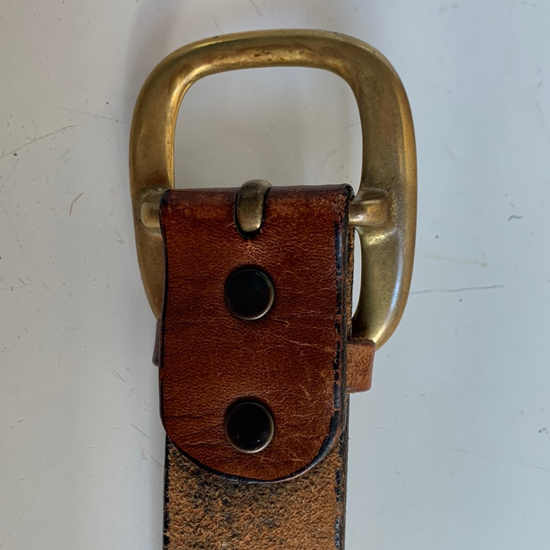 Leather belt with decorative etching