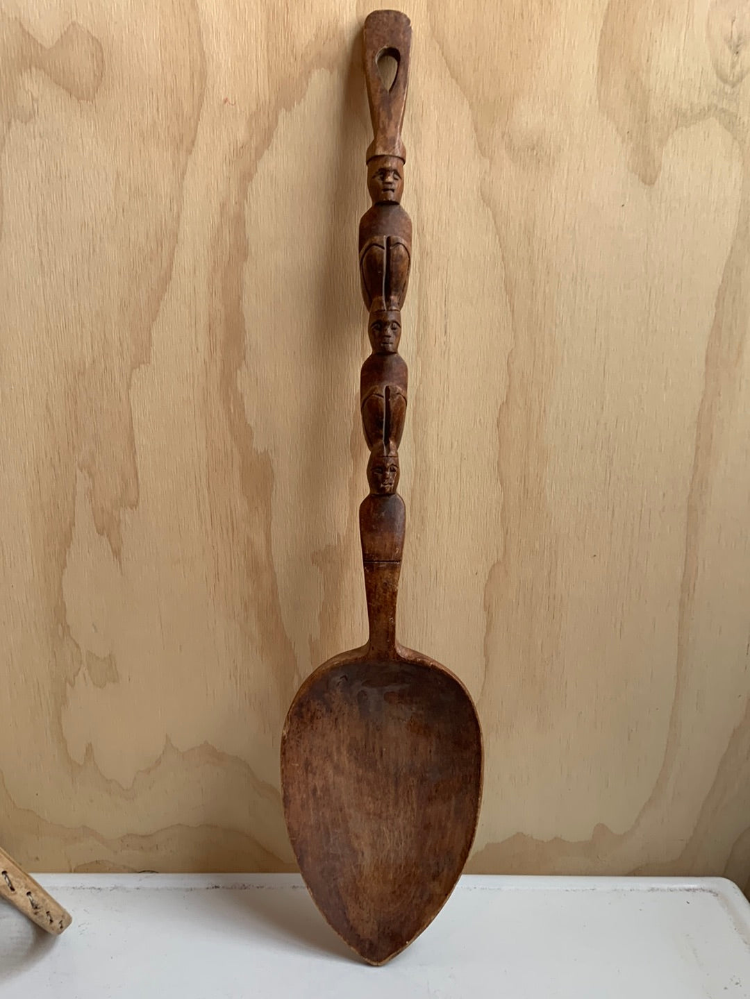 Large carved wooden spoon