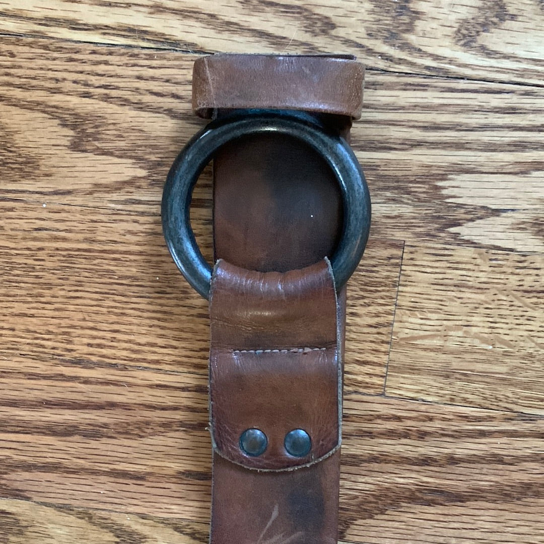 Wide leather belt with circular buckle