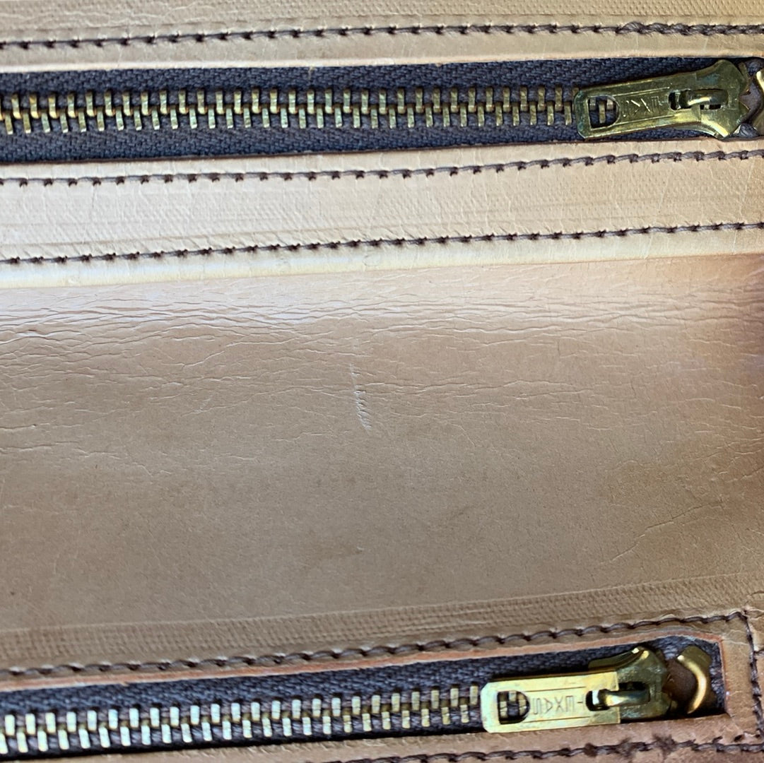 Tooled leather envelope clutch with flowers