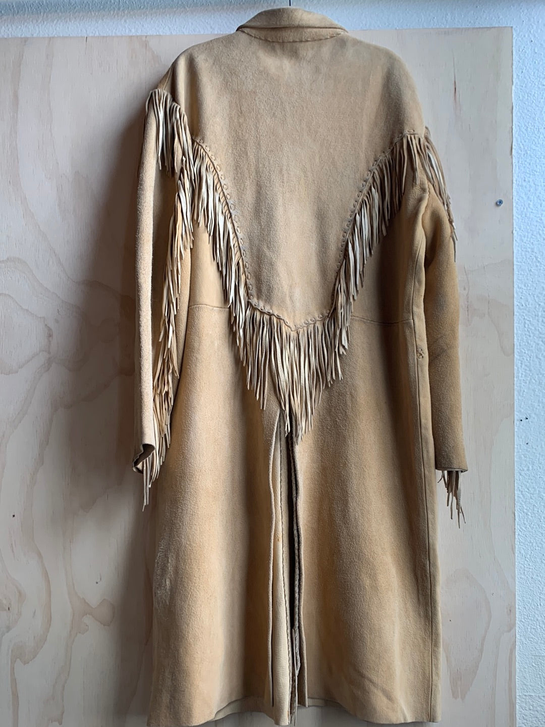 Camel leather fringed duster with silver buttons