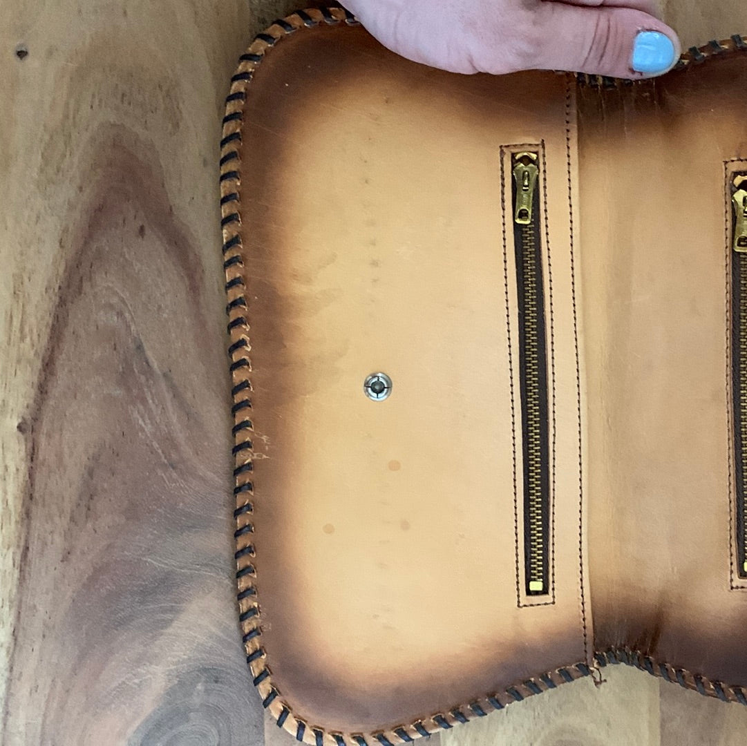 Tooled leather envelope clutch with flowers