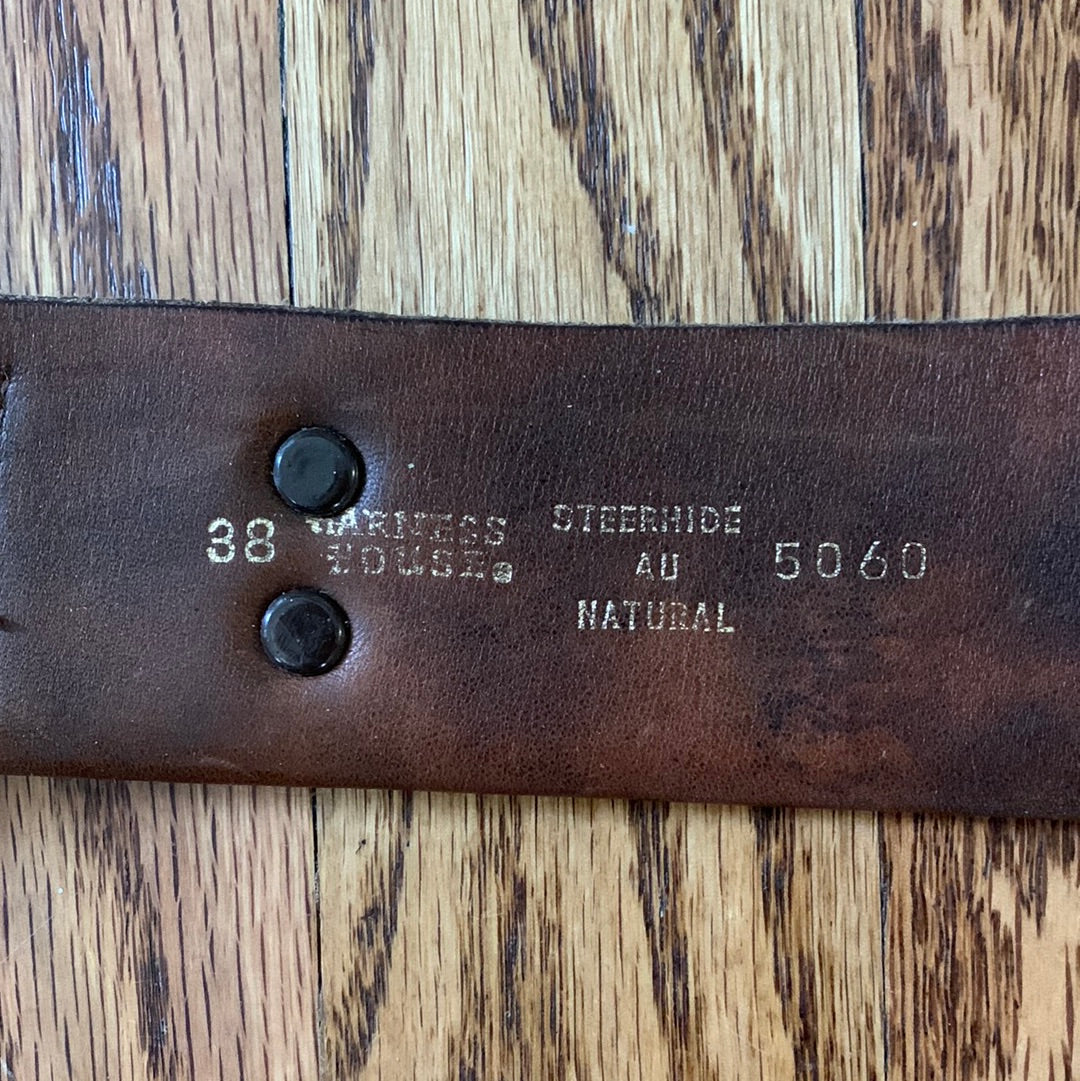 Wide leather belt with circular buckle