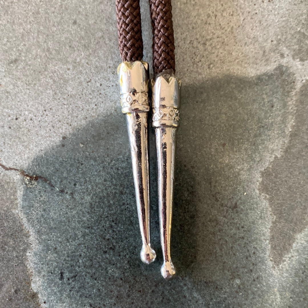 Grey silver wrapped stone bolo with brown cord