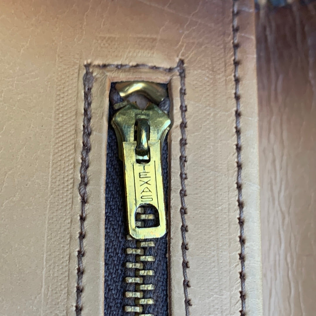 Tooled leather envelope clutch with flowers