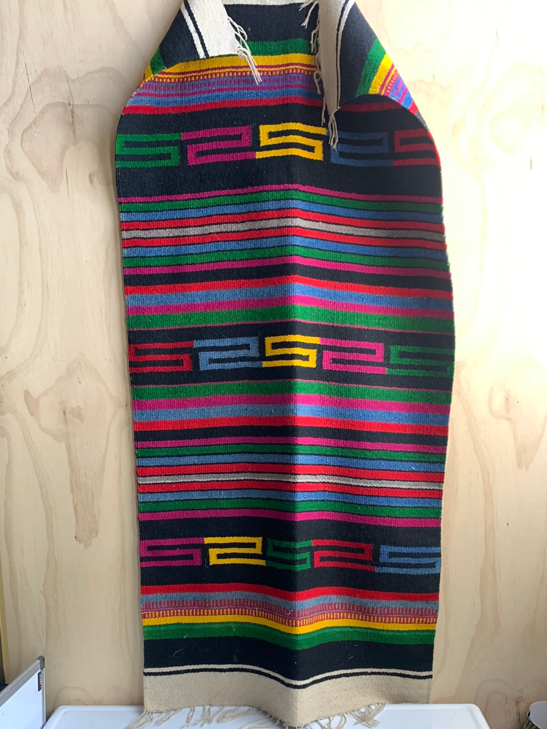 Striped woven throw with fringe