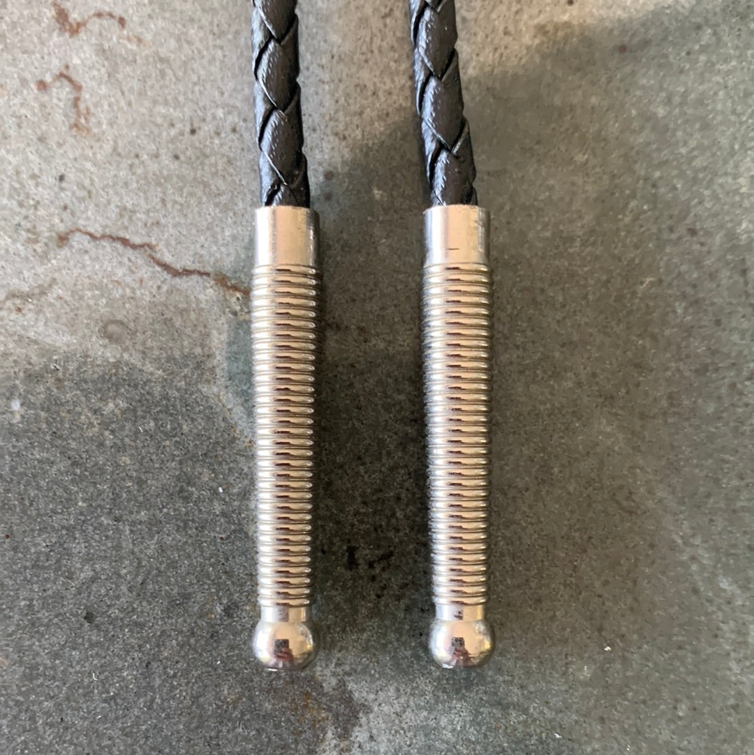 Ivory colored “J” bolo with black tie