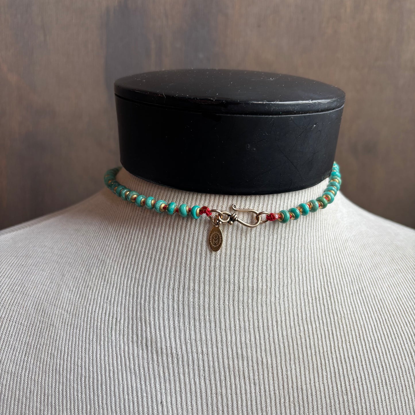 Ostrich Moon Turquoise Balanced Cross Necklace