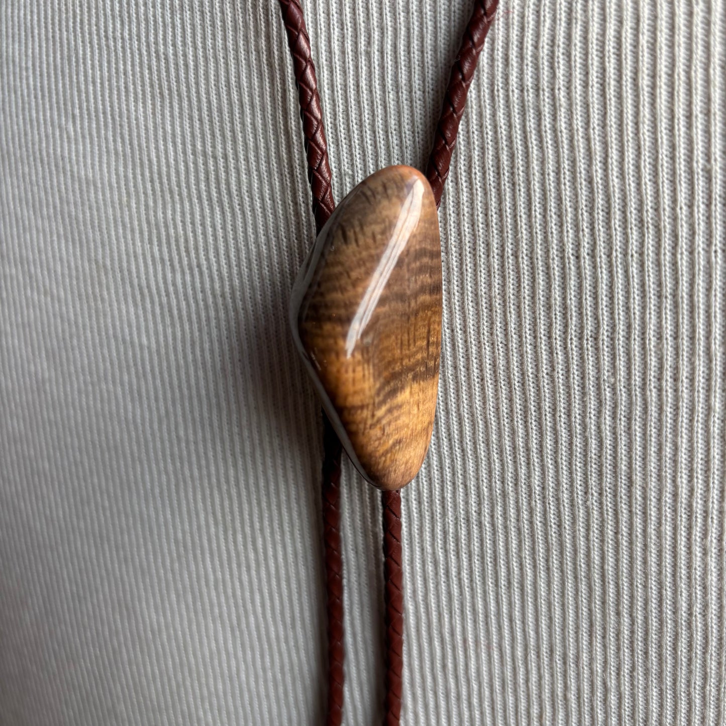Brown Polished Stone Bolo on Brown Tie