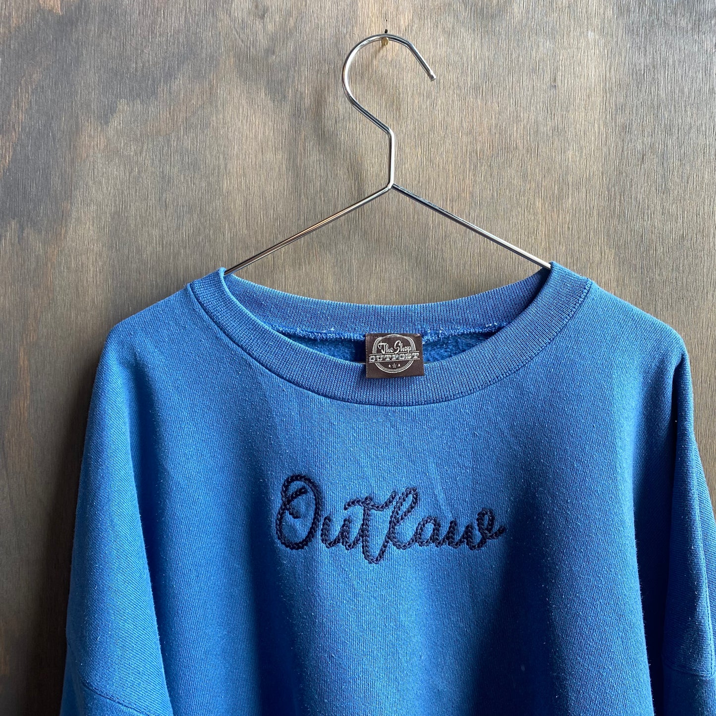 Custom blue “outlaw” sweatshirt