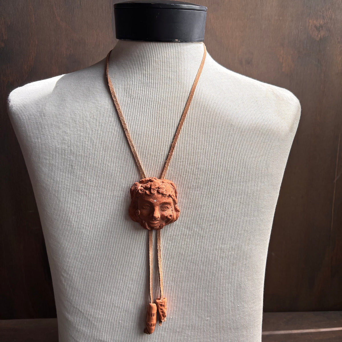 Handmade Ceramic Face Bolo on Leather Cord