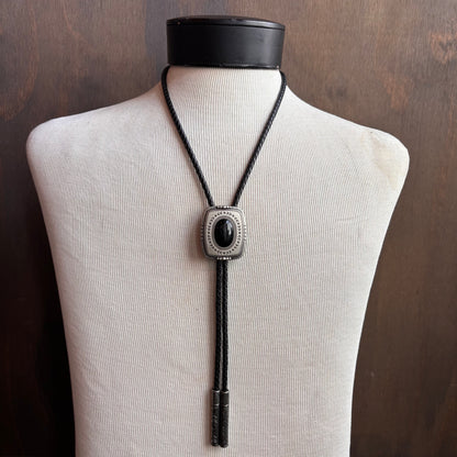 Cody James Black Stone Bolo on Black Leather Tie