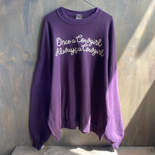 Custom purple “once a cowgirl, always a cowgirl” sweatshirt