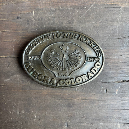 Brass Aurora CO Belt Buckle
