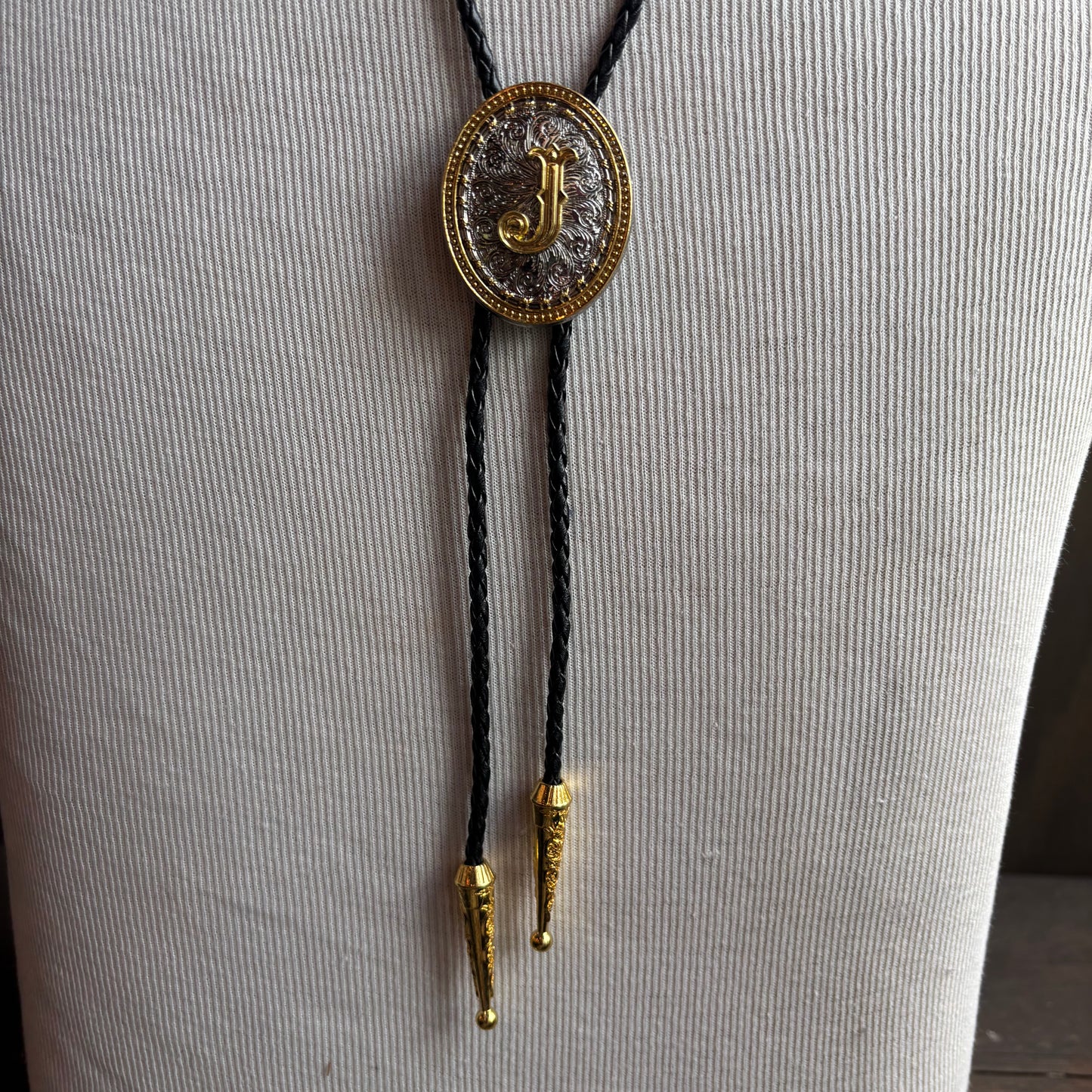 Hollywood Style "J" Bolo on Black Leather Tie