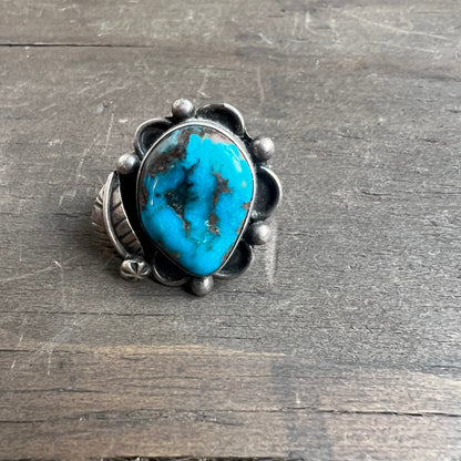 Silver and Turquoise Ring with Feather Embellishment