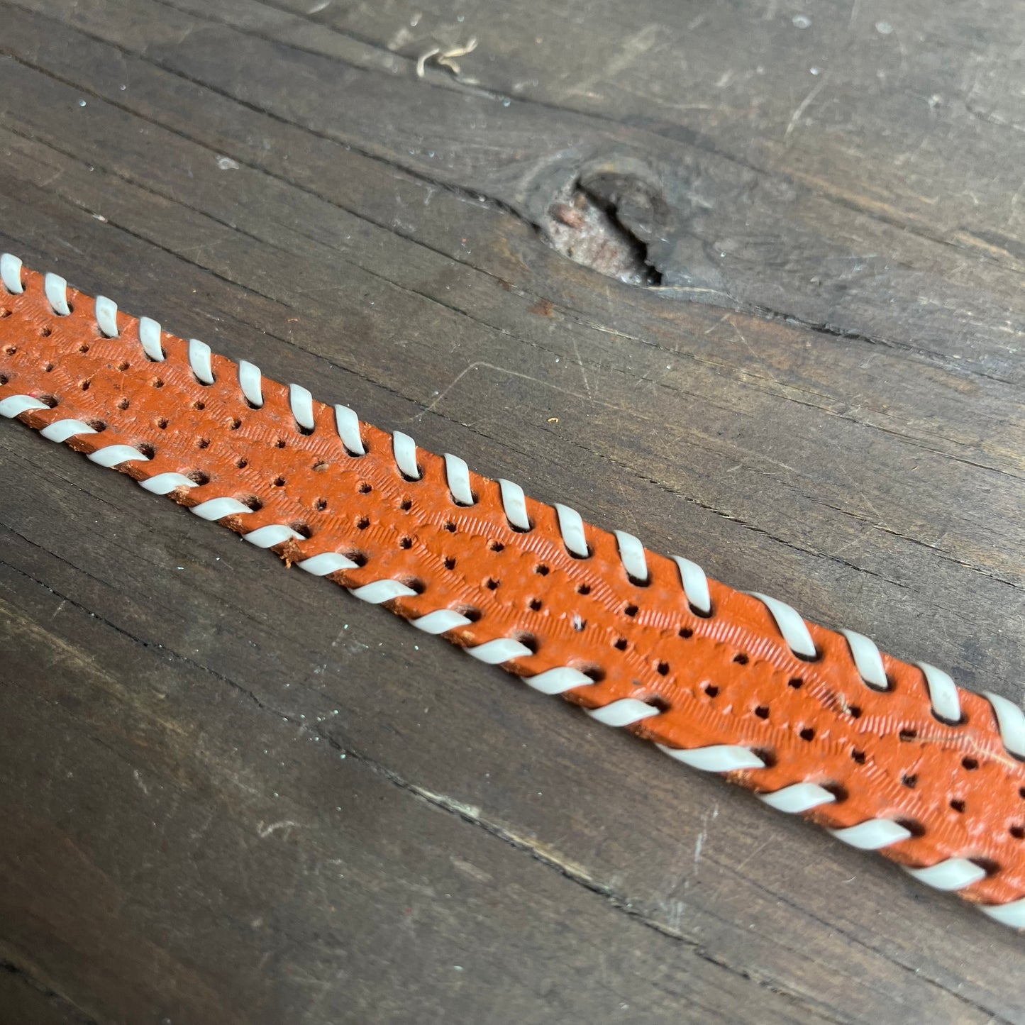 Brown leather kids belt with white wrapped sides