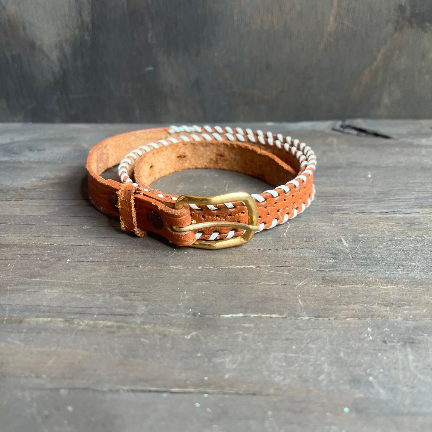 Brown leather kids belt with white wrapped sides