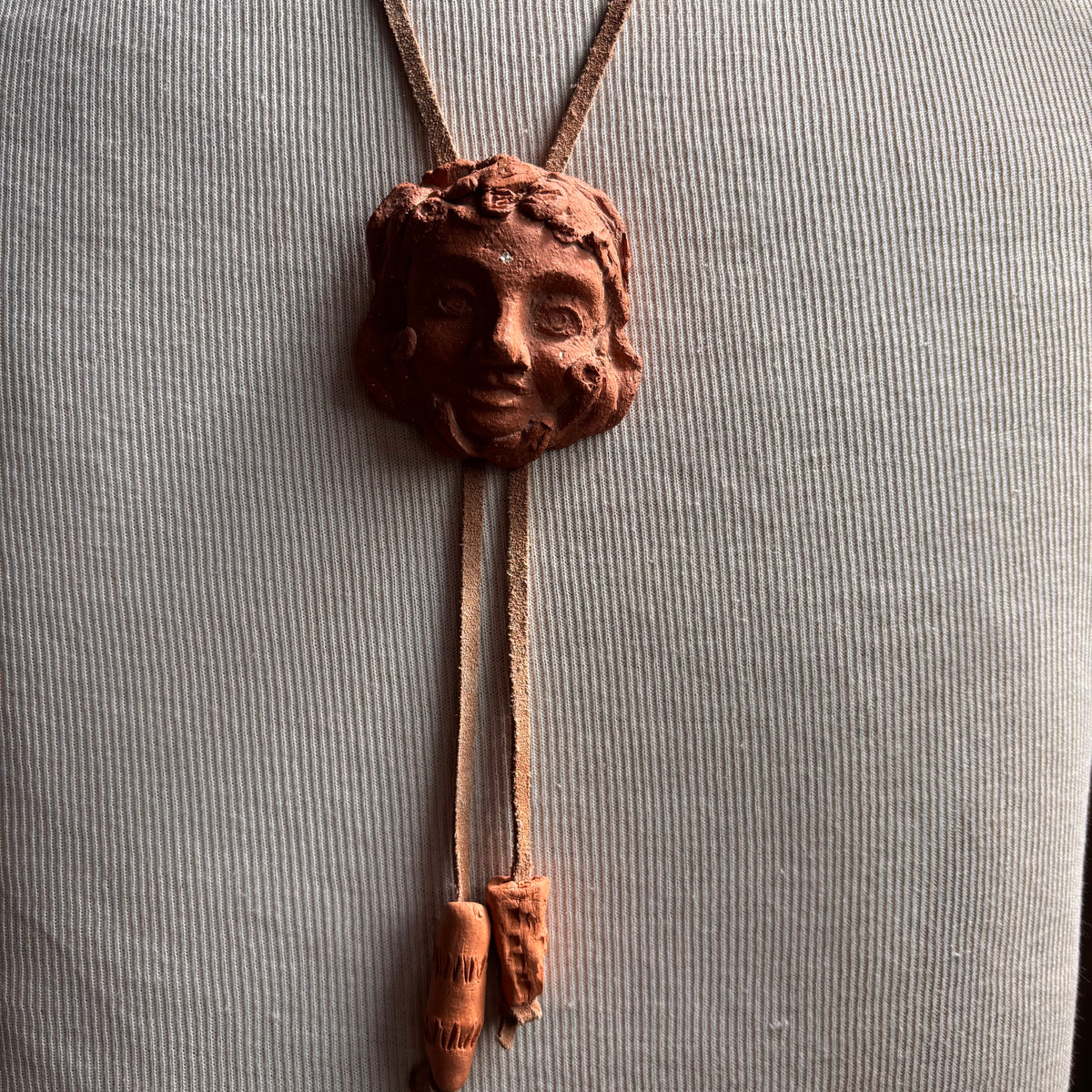 Handmade Ceramic Face Bolo on Leather Cord