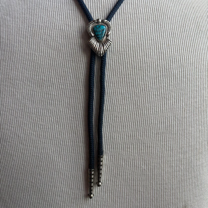 Blue Stone Bolo on Blue Tie