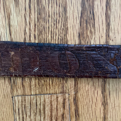 Vintage leather “Don” belt with spinning saddle buckle