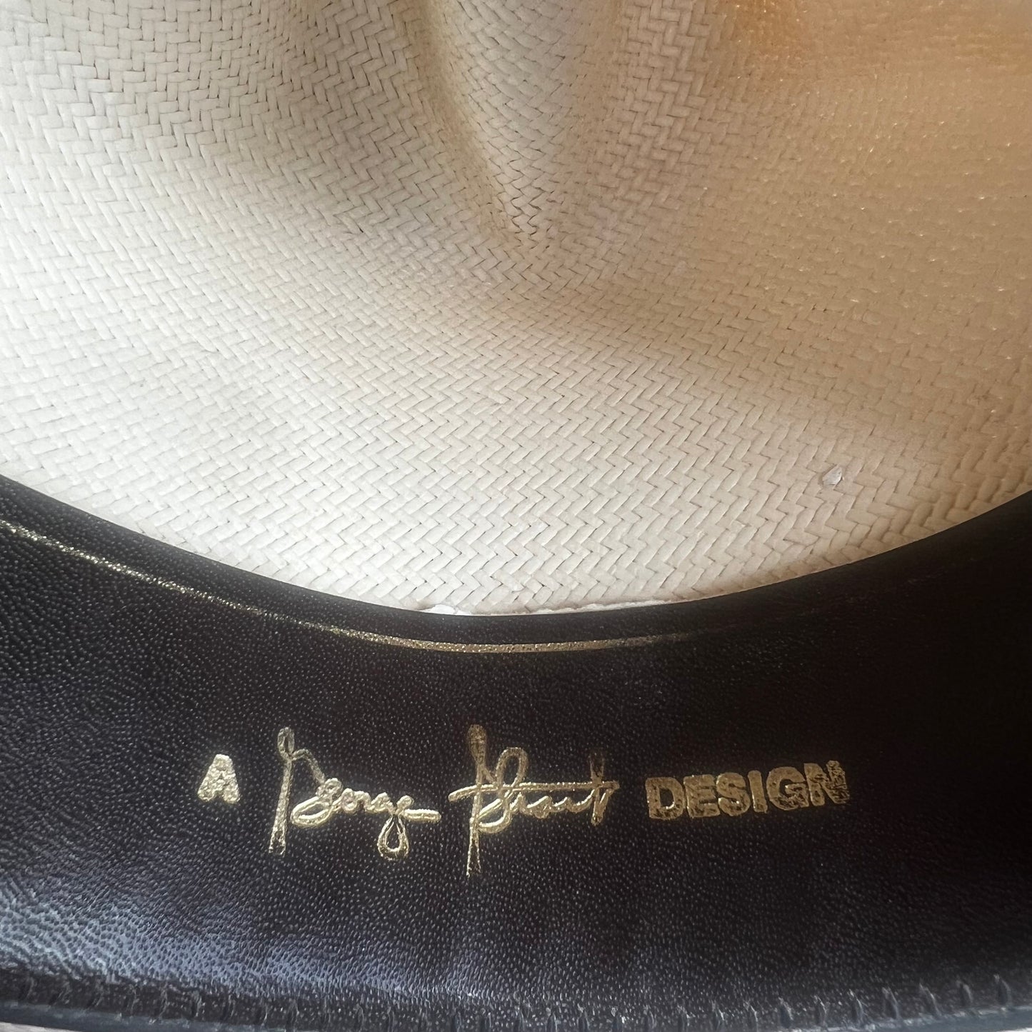Resistol Straw Hat with Brown Hat Band
