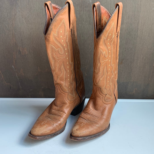 Tan Western boots with yellow & brown stitching
