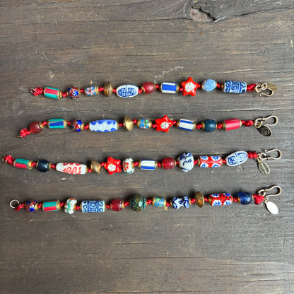 Ostrich Moon Blue and Red Beaded Bracelet