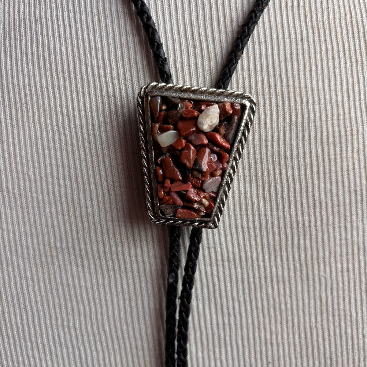 Pink Stone Chip Bolo on Black Leather Tie