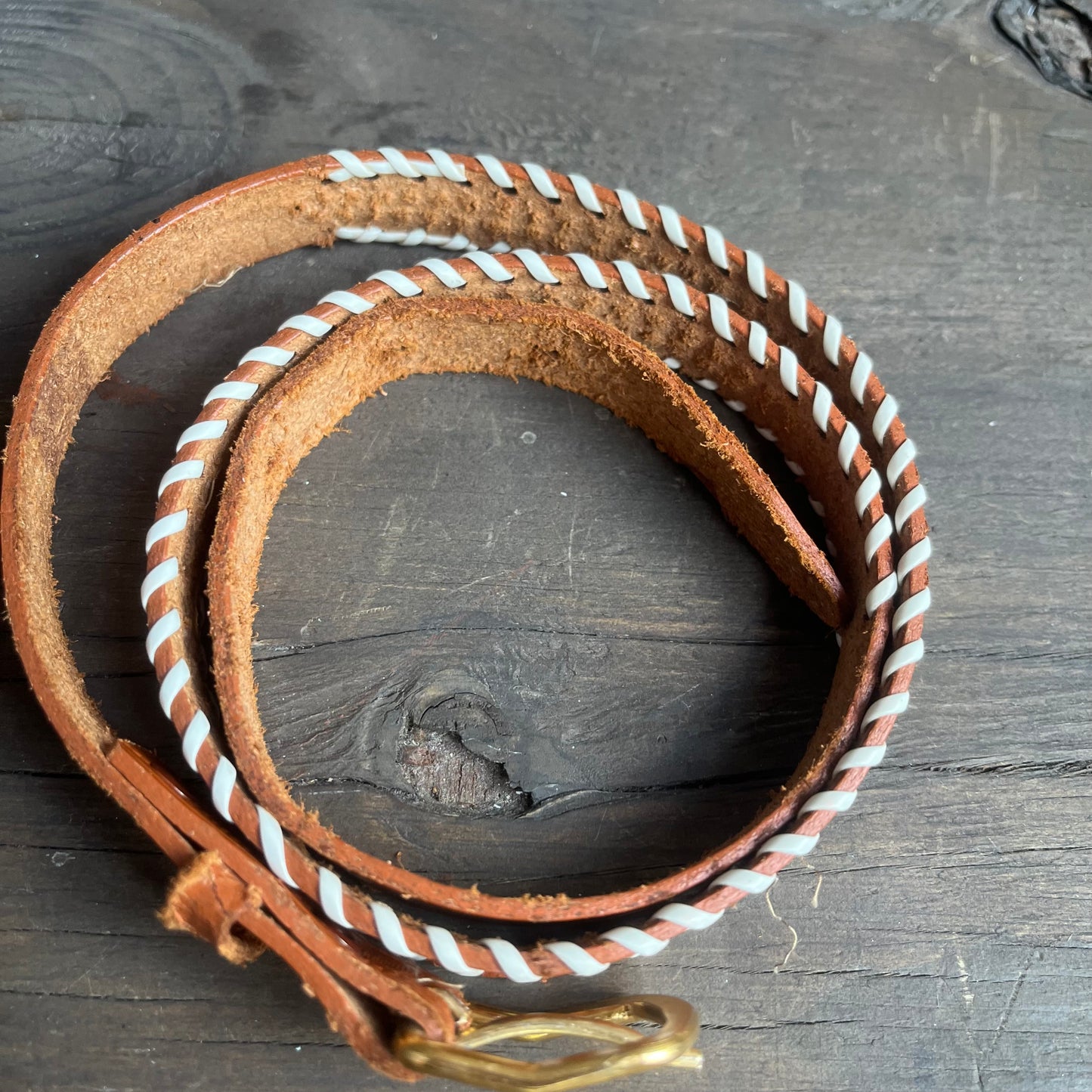 Brown leather kids belt with white wrapped sides