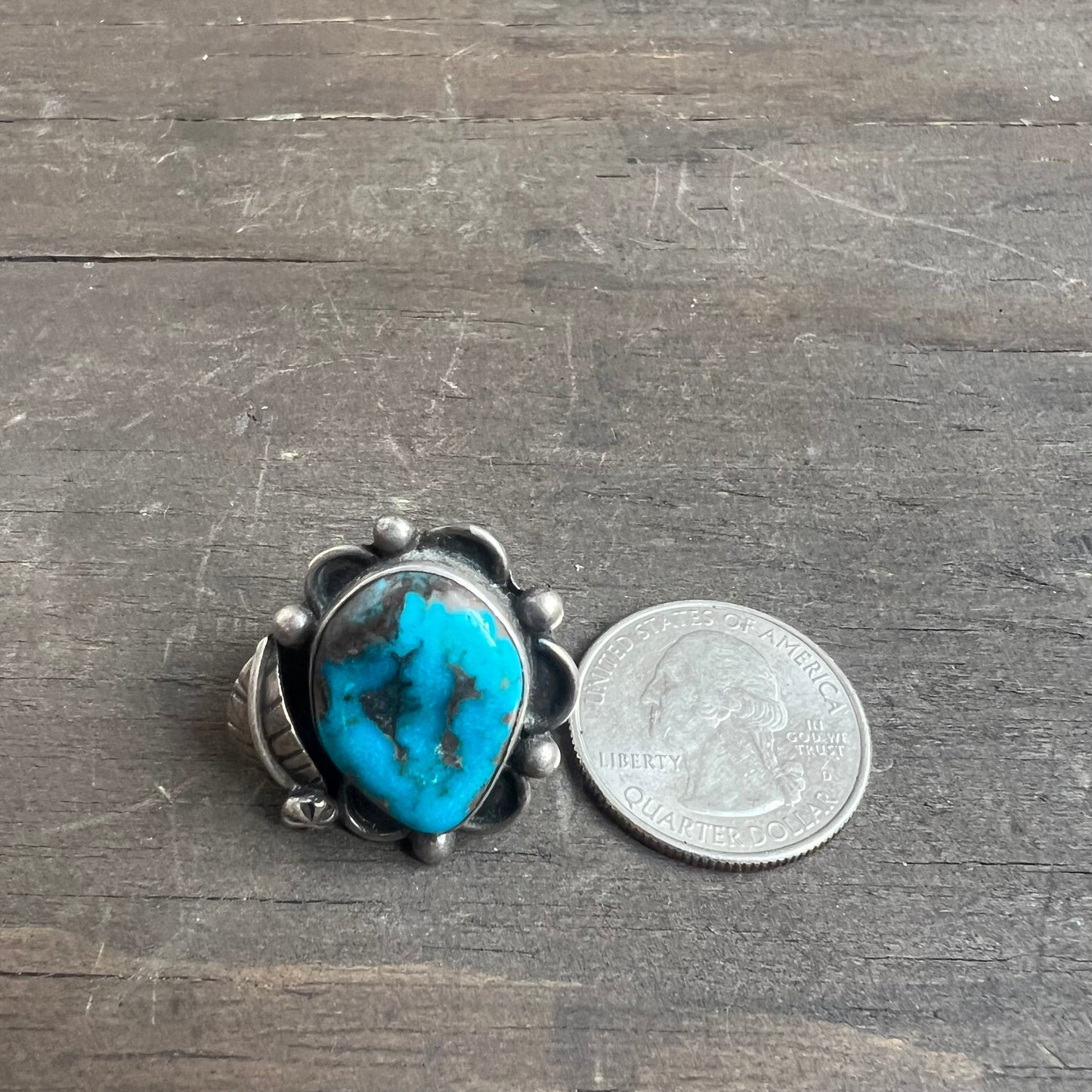 Silver and Turquoise Ring with Feather Embellishment