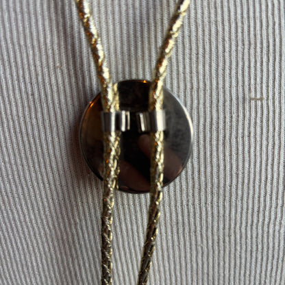 Round Enamel Bolo on Gold Tie