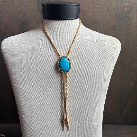 Oval Stone Bolo on Gold Tie