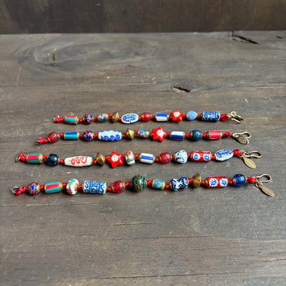 Ostrich Moon Blue and Red Beaded Bracelet