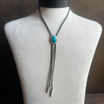 Faux Turquoise Bolo Tie on Black and White Cord