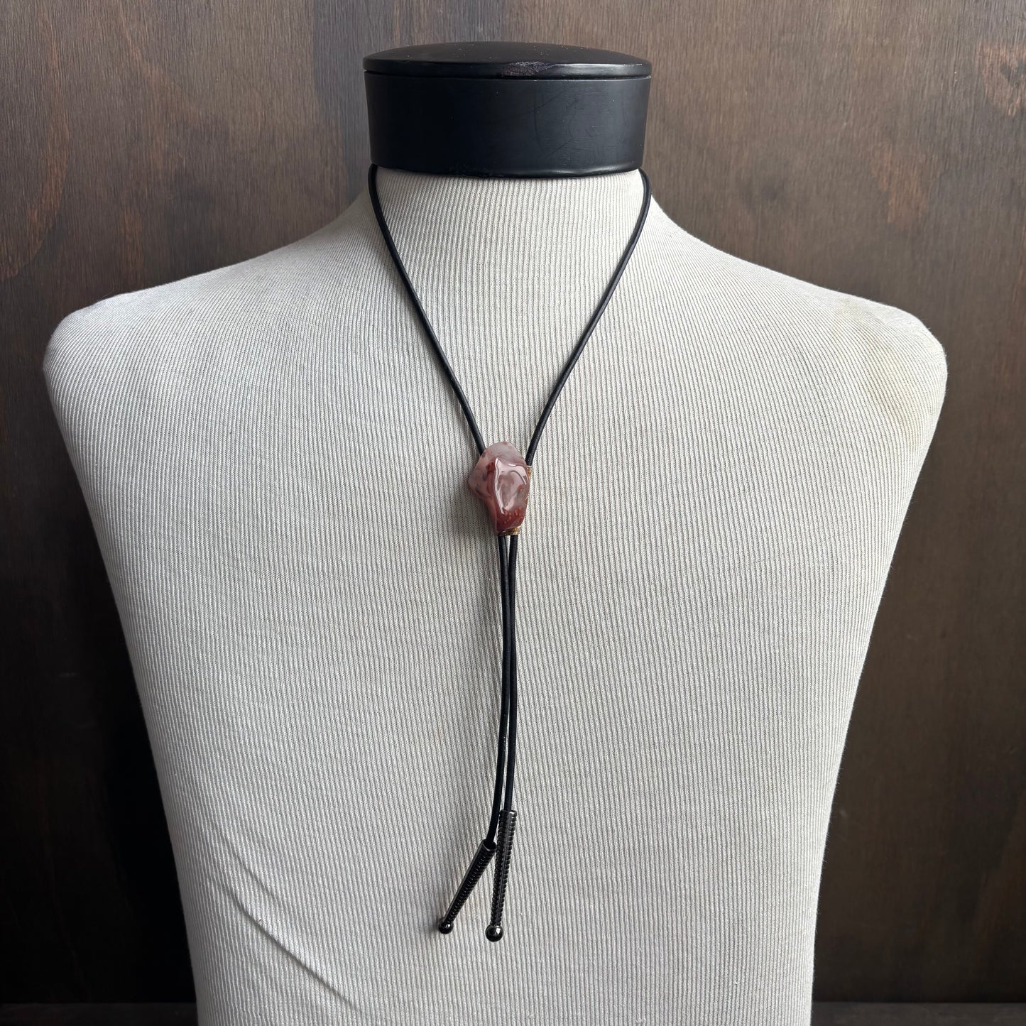 Pink Glass Bolo on Black Leather Tie