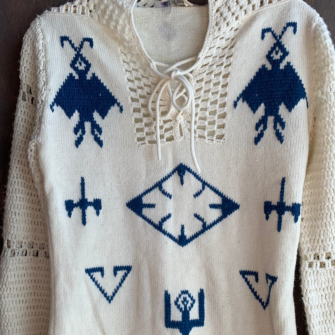 Vintage cream colored sweater with blue graphic designs