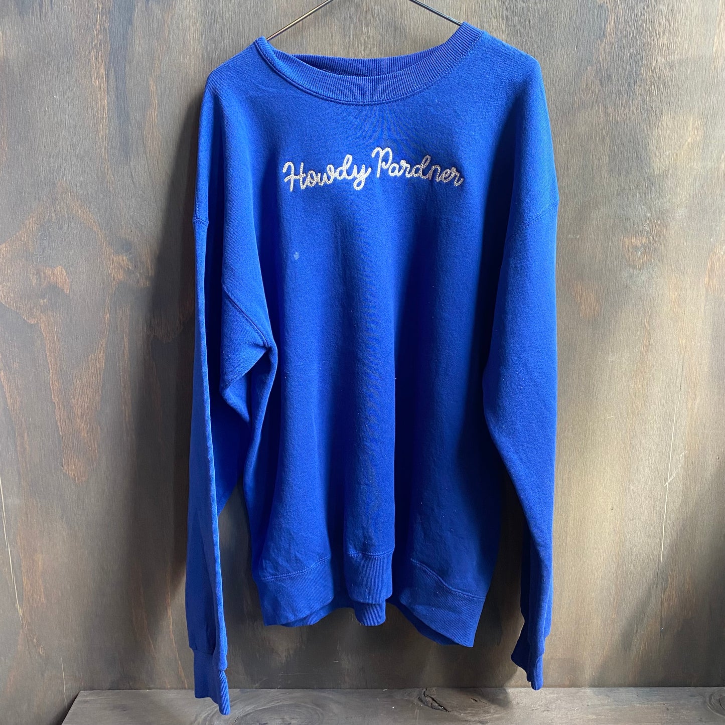 Custom blue “howdy pardner” sweatshirt