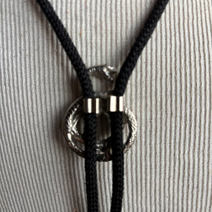 Silver Tone Snake Bolo on Black Tie