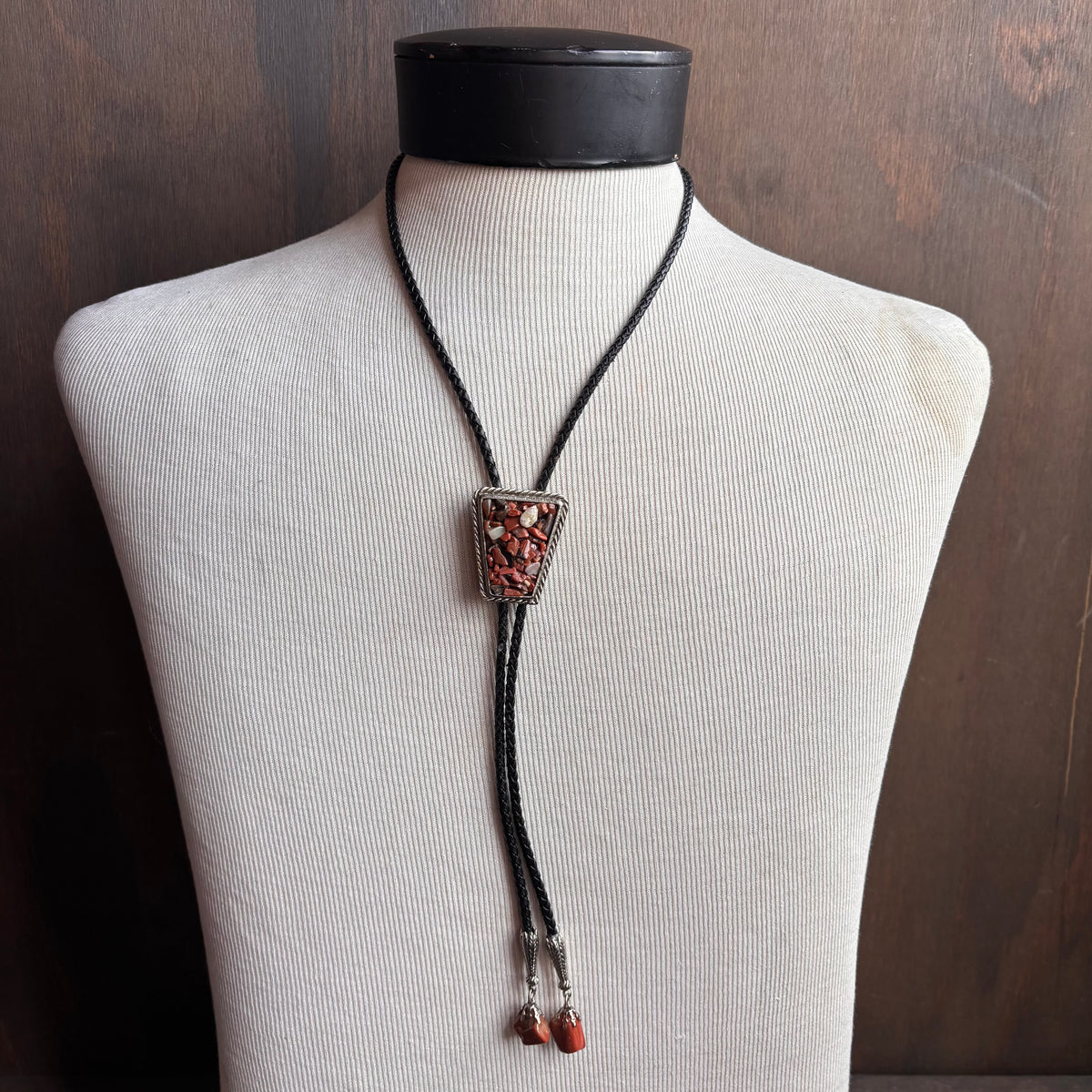 Pink Stone Chip Bolo on Black Leather Tie
