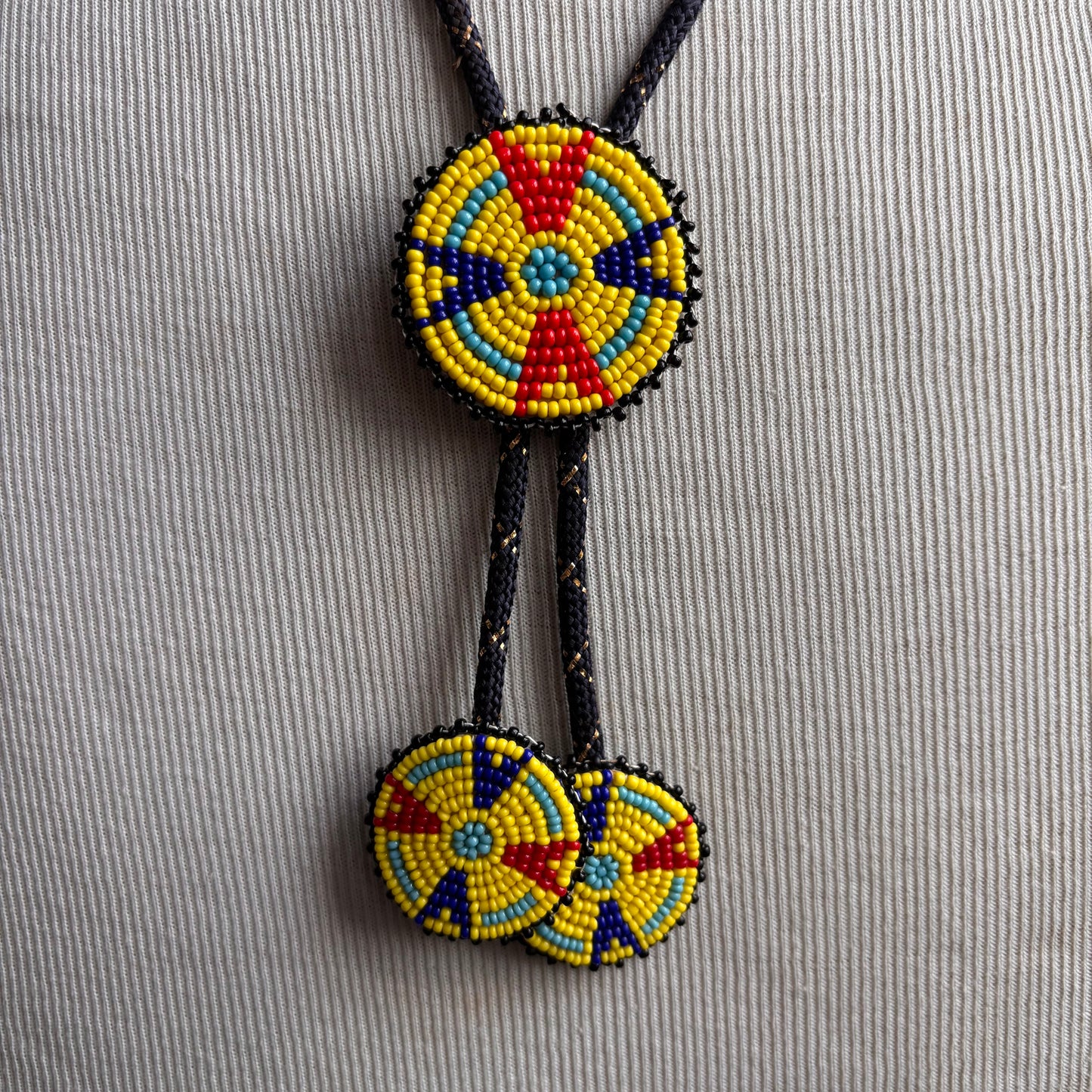 Seed Bead Medallion Bolo on Navy Tie